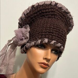 Elegant Brown Crochet Hat with Mauve Accents